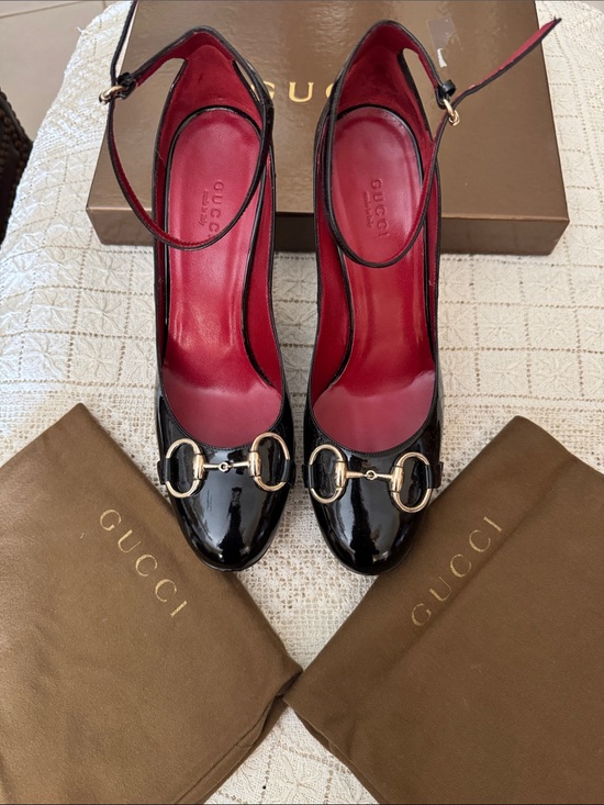 Gucci Shoes - Gucci NIB black patent platform wedges with signature brass horsebit accent.
